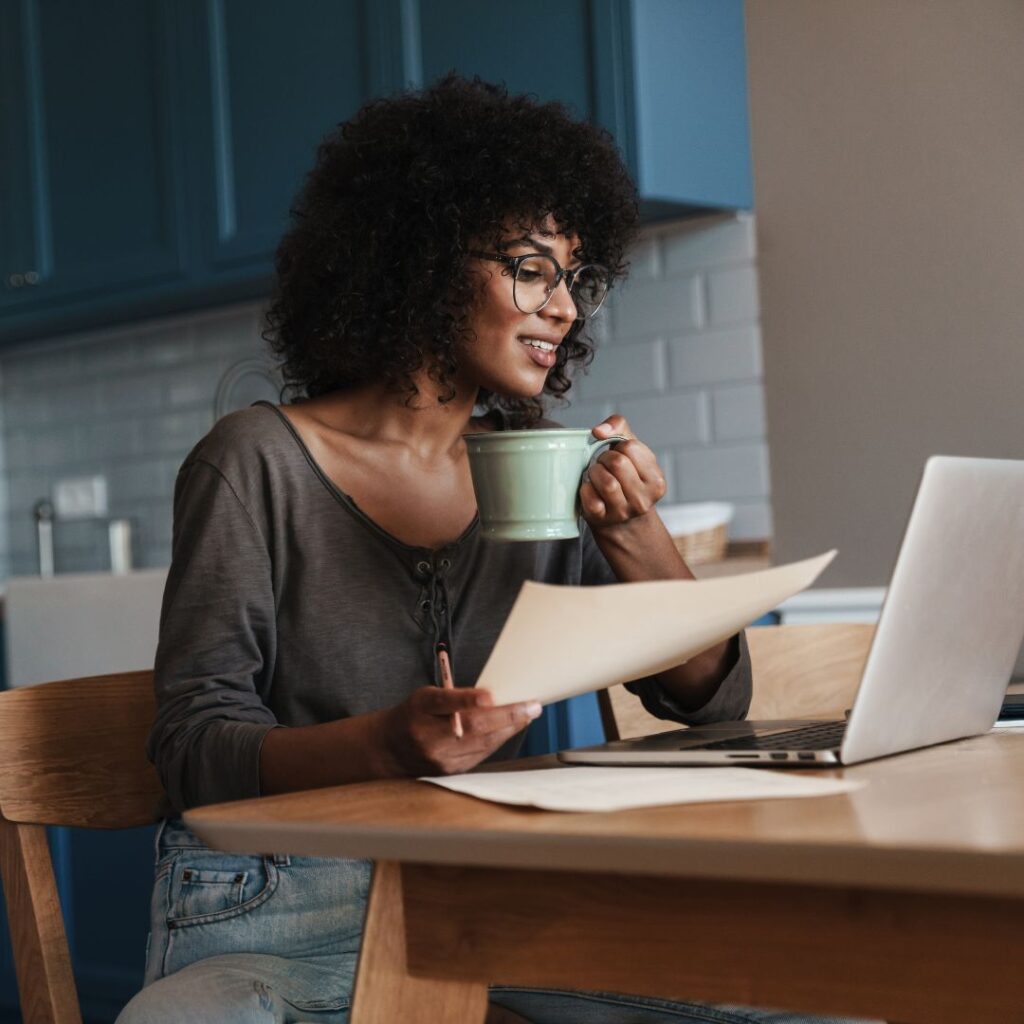 woman reading on laptop